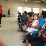 Nellet teaching a group of children